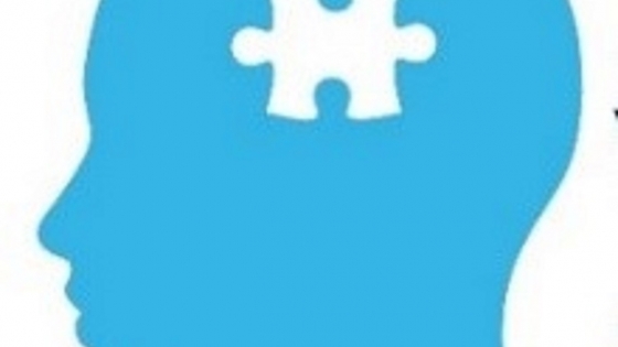 Symbool infopunt dementie Wevelgem. Blauw hoofd met daarin een wittte puzzelstuk